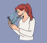 Person scrolling on phone late at night